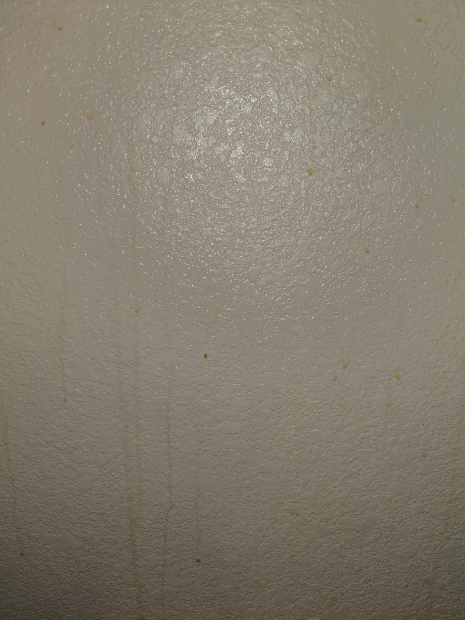 How to Clean Yellow Drips on Bathroom Walls: Quick Tips!