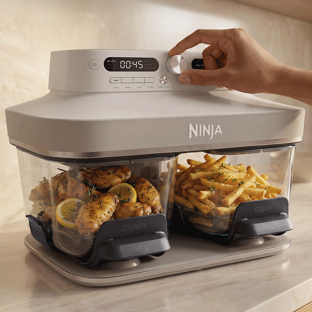 Cleaning a Ninja Foodi pressure cooker and air fryer with a microfiber cloth and baking soda paste near the fan guard and silicone ring.